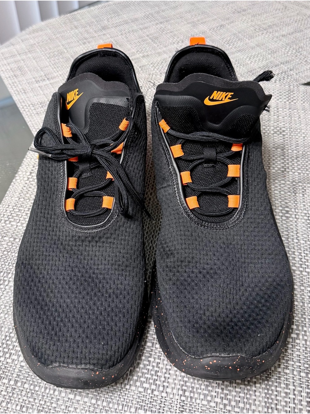 Nike Men’s Black Athletic Sneakers with Orange Accents